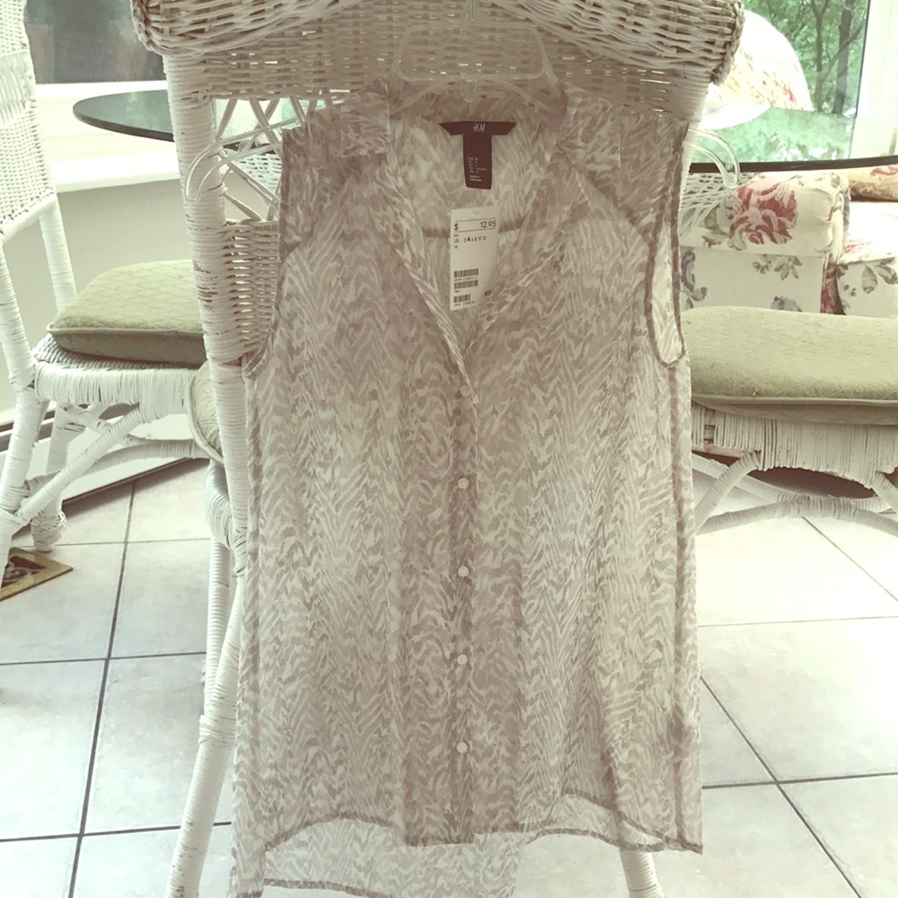 BRAND NEW SLEEVELESS BLOUSE